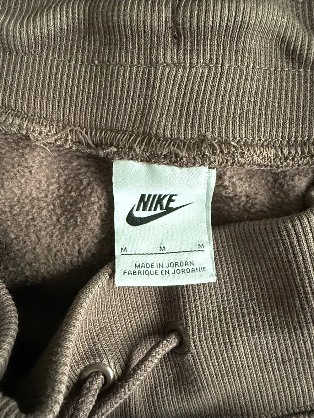 Nike Women's Taupe Athletic Drawstring Shorts with White Swoosh